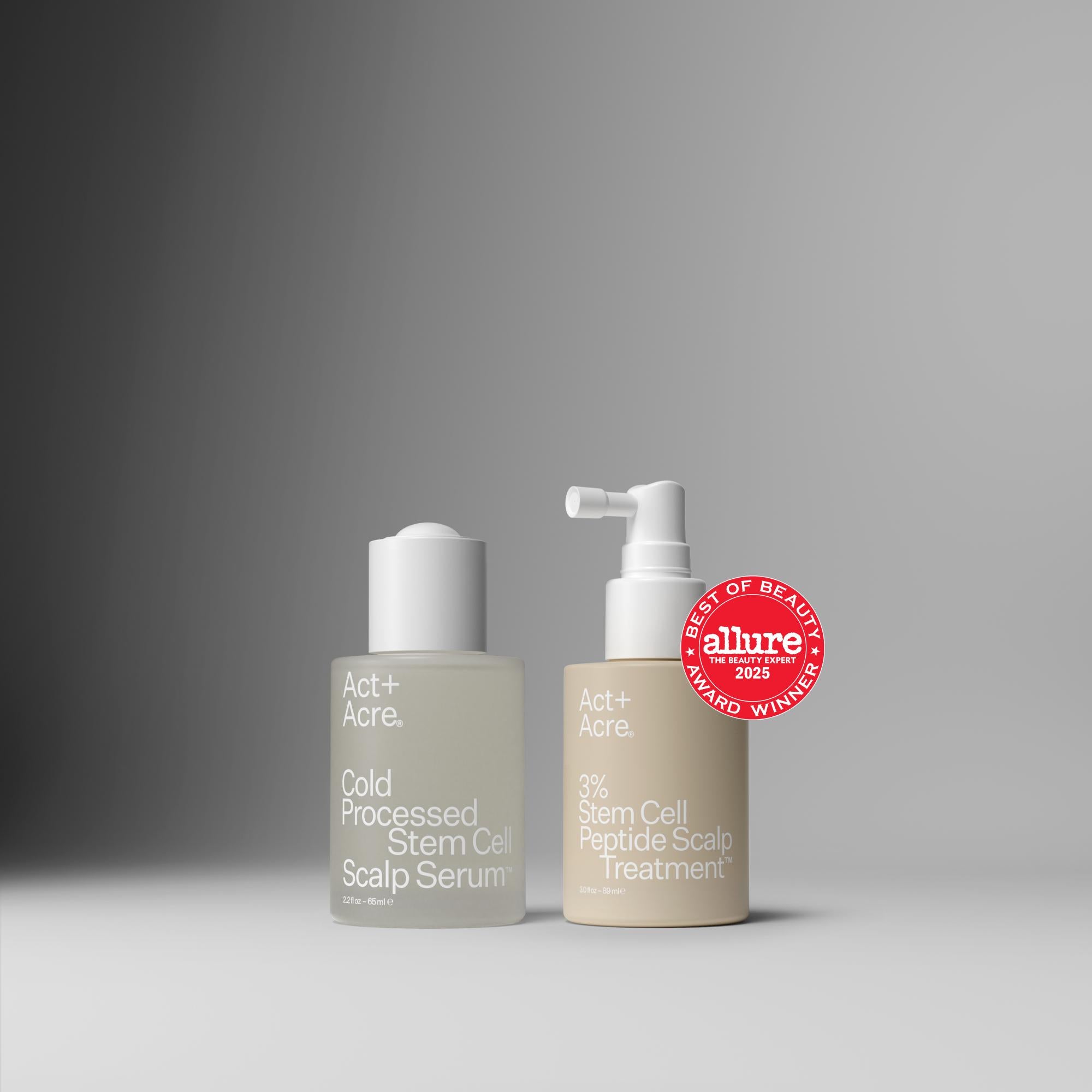 Two skincare bottles with a 'Best of Beauty' award on a gray background